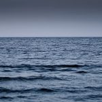 image shows an ocean horizon